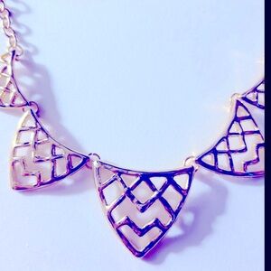 Free💰 w bundle. Necklace,bGold-tone open triangles, graduated detail 18” adj.